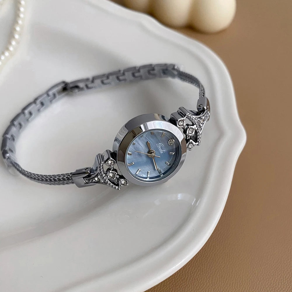 Reloj Dorado con Cristales