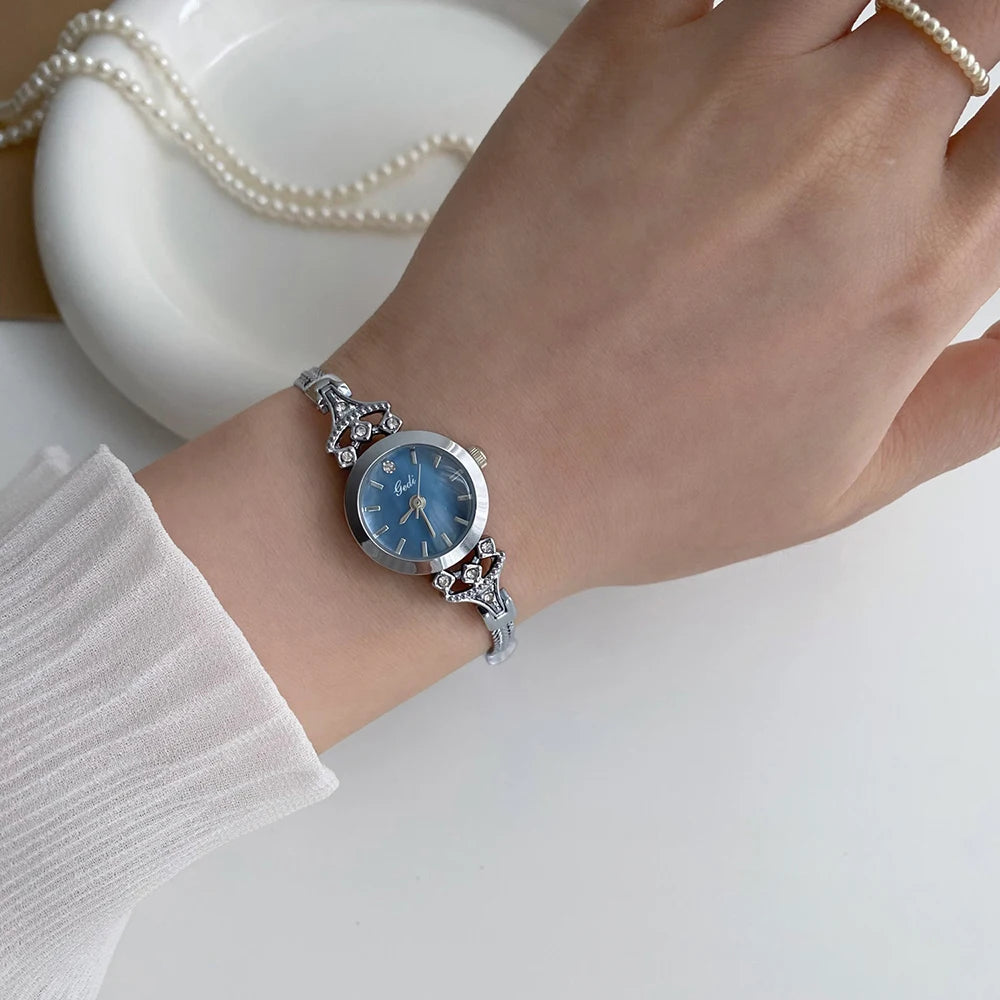 Reloj Dorado con Cristales